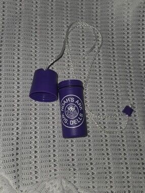 Noah's Ark Wis. Dells waterproof plastic holder on string